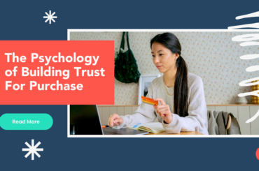 The psychology of building trust for purchase - read more. The banner also features a woman holding her credit card as she looks at her laptop.