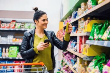 A woman shopping at a grocery store