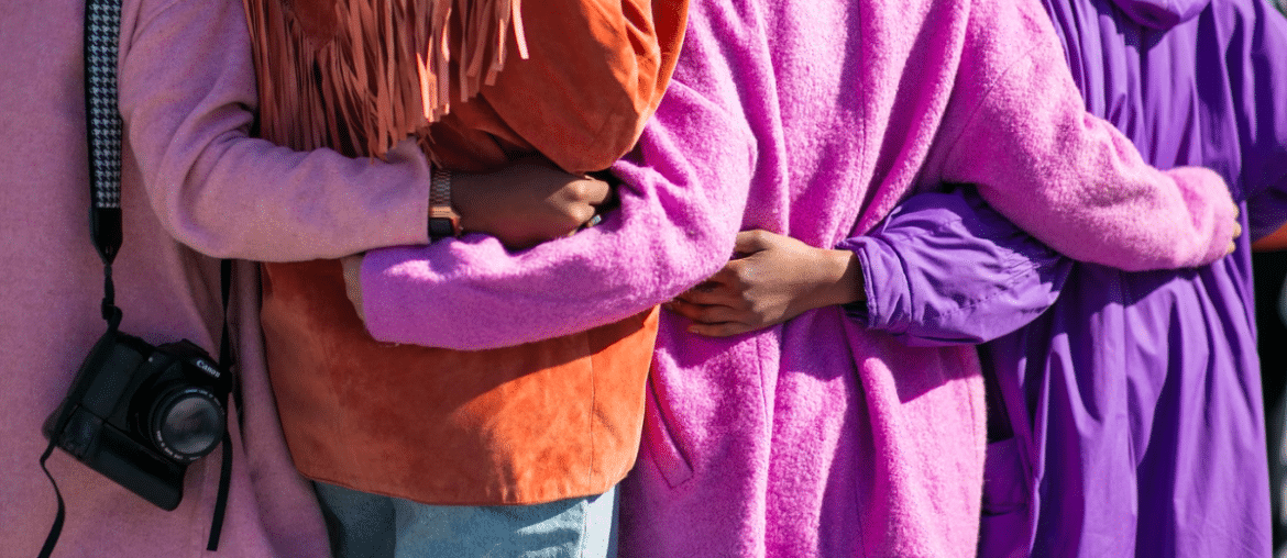 A group of friends hugging