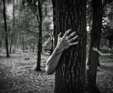 Zombie hand hugging a tree