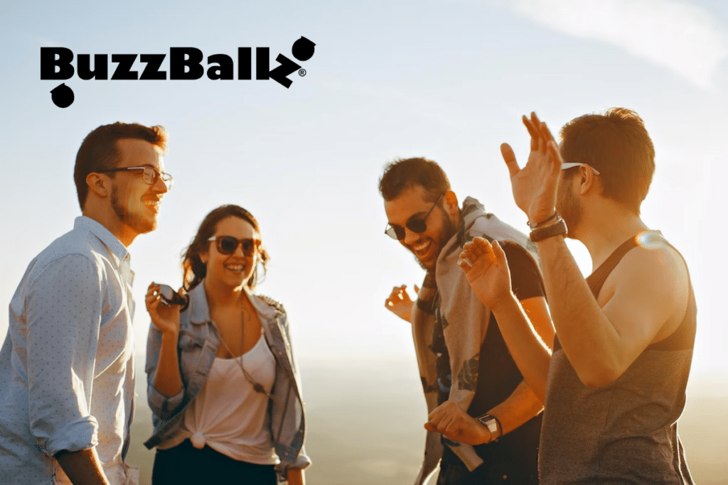 A group of friends with BuzzBallz on top